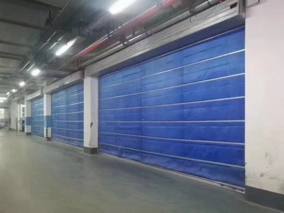 Inorganic fabric fire retardant rolling shutter door